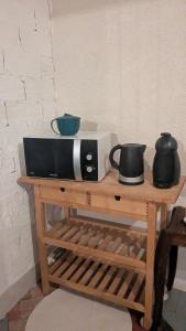 Příslušenství pro přípravu čaje a kávy v ubytování La gargolette