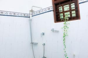 Koupelna v ubytování Trio Jay Villa + 20 fotografií