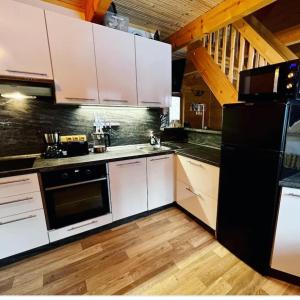 Köök või kööginurk majutusasutuses Kemp Ubislav