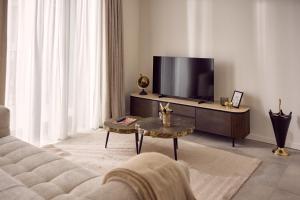 Un televizor și/sau centru de divertisment la Van der Valk Hotel Mechelen