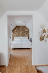 Giường trong phòng chung tại Ferienhaus am HerbstHof