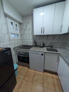 Η κουζίνα ή μικρή κουζίνα στο 195 Livingtarifa Jazmin