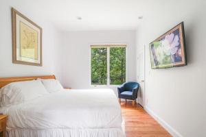 Ένα ή περισσότερα κρεβάτια σε δωμάτιο στο Villa Hollow