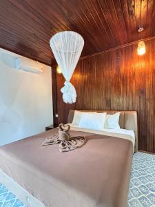 Postel nebo postele na pokoji v ubytování Bayview Hill Resort