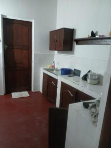 Kuchyň nebo kuchyňský kout v ubytování Golden Wave Hotel + 3 fotografie