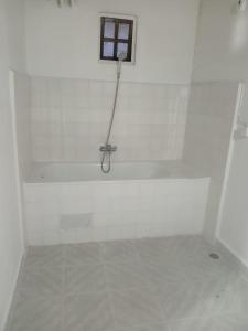 Koupelna v ubytování Golden Wave Hotel