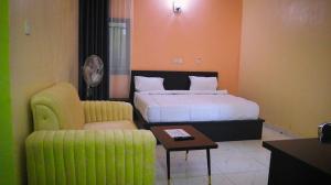 Ένα ή περισσότερα κρεβάτια σε δωμάτιο στο Oyako Hotel Limited