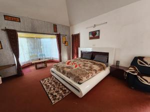 Ένα ή περισσότερα κρεβάτια σε δωμάτιο στο Wings Cottage