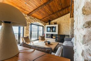 Телевизор и/или развлекательный центр в Casa Rural En El Balcón Del Delta Del Ebro