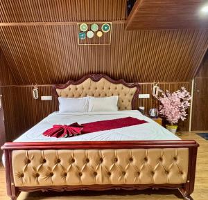 Ένα ή περισσότερα κρεβάτια σε δωμάτιο στο Wings Cottage +5 φωτογραφίες