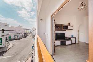 a room with a view of a city street at Apartment Old Town Reina Sofia 1 in Puerto del Carmen