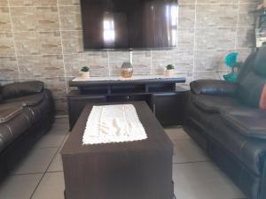 Χώρος καθιστικού στο Sharon's Homestay