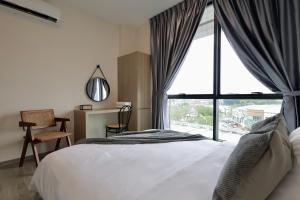 Ένα ή περισσότερα κρεβάτια σε δωμάτιο στο deLOFTS Emporium - Kuching - Vacay Home +123 φωτογραφίες