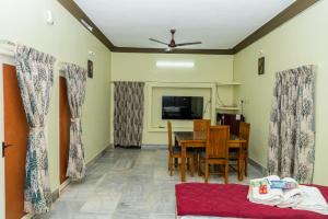 TV a/nebo společenská místnost v ubytování Live Inn RMS