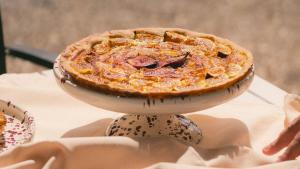 a pie sitting on top of a table at Tenuta Doxi in Gallipoli +73 photos