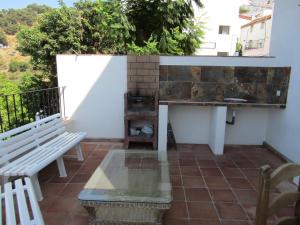 Casas Rurales Jardines del Visir tesisinde bir balkon veya teras