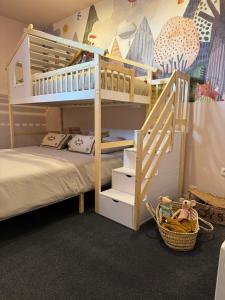 Postel nebo postele na pokoji v ubytování Petit Riche Apartments