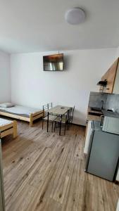 Kuchyň nebo kuchyňský kout v ubytování Golenicka Przystań Golenice 73a