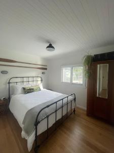 Ένα ή περισσότερα κρεβάτια σε δωμάτιο στο Sailors Snug