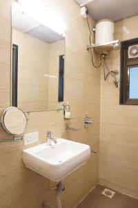 Ένα μπάνιο στο Executive Hotel Pearl Inn