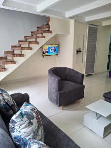 Posezení v ubytování casa entera 2 pisos