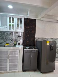 Kuchyň nebo kuchyňský kout v ubytování casa entera 2 pisos