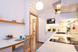 Η κουζίνα ή μικρή κουζίνα στο GuestHost - Casa Klimt