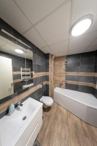 Koupelna v ubytování NAR Royalton Apartment #27