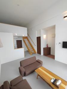 Μια τηλεόραση ή/και κέντρο ψυχαγωγίας στο ペンションsakuraＬＥＦＴ