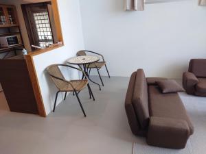 Χώρος καθιστικού στο ペンションsakuraＬＥＦＴ