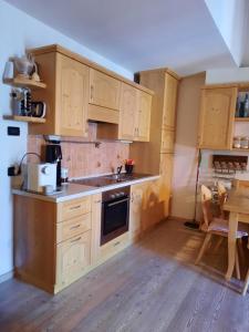 Η κουζίνα ή μικρή κουζίνα στο Appartamento la Fontana +10 φωτογραφίες