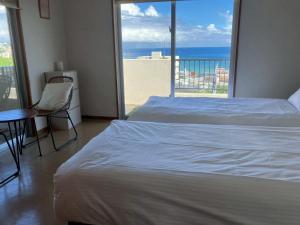 Ένα ή περισσότερα κρεβάτια σε δωμάτιο στο Plus-one from Cg7p +22 φωτογραφίες