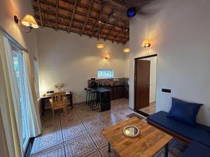 Χώρος καθιστικού στο BRAMHA COTTAGES