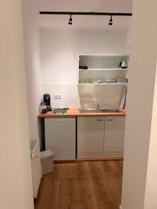 Køkken eller tekøkken på Saniertes Apartment für Paare und Geschäftsreisende in Recklinghausen Röllinghausen