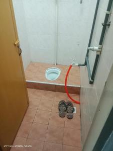 Ένα μπάνιο στο Homestay Casa Mutiara +6 φωτογραφίες