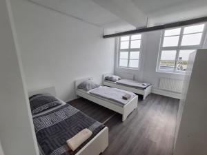 Ένα ή περισσότερα κρεβάτια σε δωμάτιο στο Nice Apartment in Vöhringen