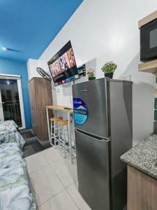 Η κουζίνα ή μικρή κουζίνα στο M-Cubed Suites at South Residences