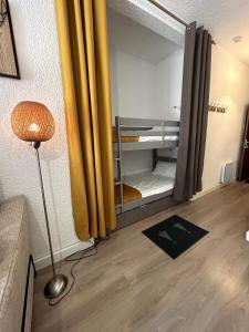 Ένα ή περισσότερα κρεβάτια σε δωμάτιο στο Le Pré Carré Studio premium, ski easy et centre St Lary