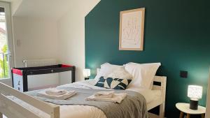 Ένα ή περισσότερα κρεβάτια σε δωμάτιο στο Gîte L'Écrin - Maison de charme 8Pers - By Primo