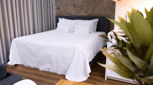 Postel nebo postele na pokoji v ubytování D Maria Apartments