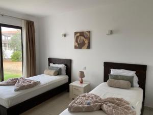 En eller flere senge i et værelse på Casa de Cabo Verde + 34 billeder