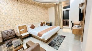 TV/trung tâm giải trí tại Spree Ashodev Hotel