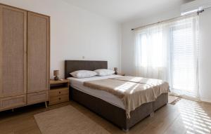 Postel nebo postele na pokoji v ubytování Villa Dolina Opuzen by Villas Guide + 30 fotografií