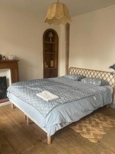 Postel nebo postele na pokoji v ubytování Ô Mon Aubrac