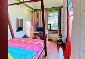 Voodi või voodid majutusasutuse Phu Mi Lum Nao house by Nasi Jampu, Chiang Mai toas