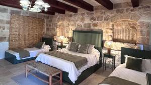 Voodi või voodid majutusasutuse Ta Skorba Farmhouse Mgarr toas