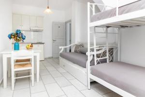 Ένα ή περισσότερα κρεβάτια σε δωμάτιο στο Depis studios