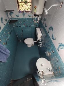 Ένα μπάνιο στο Peaceful 1BHK Hideaway in Aldona, North Goa