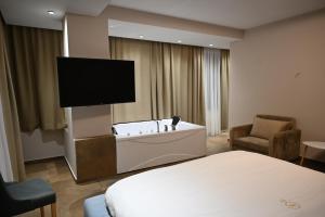 TV/trung tâm giải trí tại Hotel Restaurant Savoja