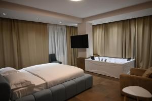 Giường trong phòng chung tại Hotel Restaurant Savoja +101 ảnh